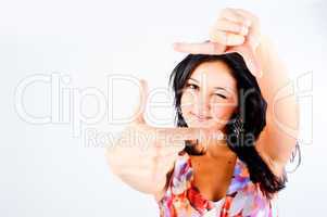 Girl with frame gesture. Focus on fingers