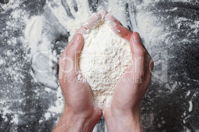 Hands holding wheat