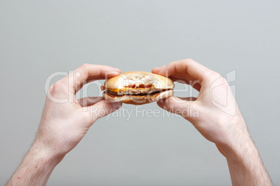 Man eating burger