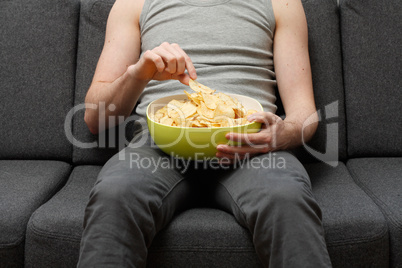 Man eating chips