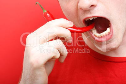 Eating chili pepper