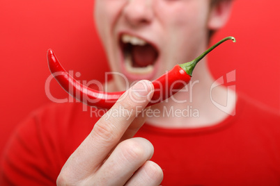 Eating chili pepper