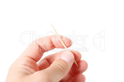 Hand holding toothpicks
