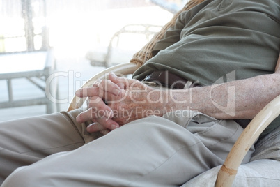 Senior sitting in chair