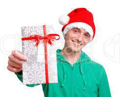 Man with santa hat holding christmas present