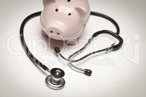 Piggy Bank and Stethoscope with Selective Focus