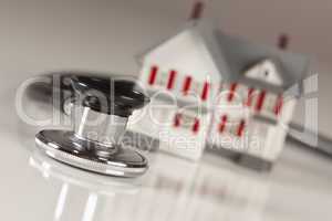 Stethoscope with Small Model Home