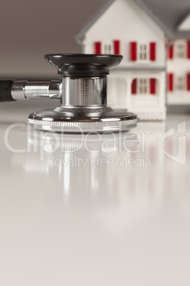 Stethoscope with Small Model Home