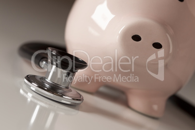 Piggy Bank and Stethoscope with Selective Focus