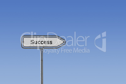 Success sign on signpost