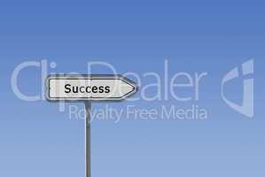 Success sign on signpost