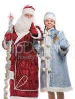 Santa Claus and snow maiden giving thumbs-up sign