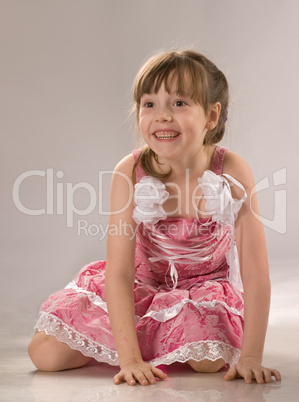Beautiful little girl in pink dress