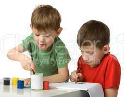 Two boys draw