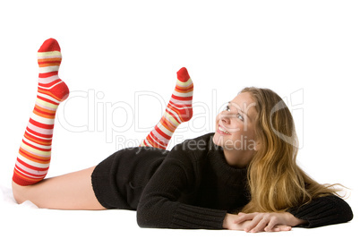 beautiful smiling girl lies on the floor