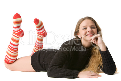 beautiful smiling girl lies on the floor