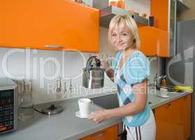 young woman preparing tea