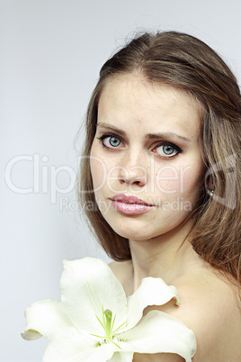 attractive girl with a lily