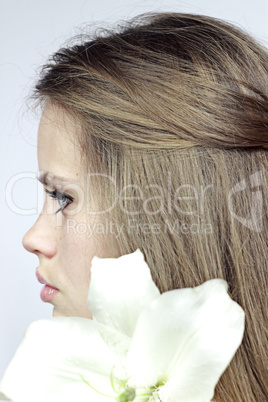 Profile the girl with a lily