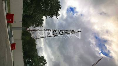pylon in the dramatic sky. vertical timelapse.