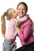 Daughter kisses a mother