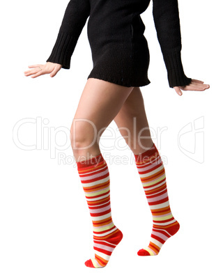 women's legs in stripped long socks