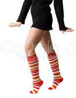 women's legs in stripped long socks