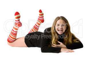 smiling girl lies on the floor
