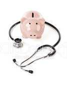 Piggy Bank and Stethoscope Isolated