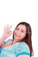 young happy woman giving ok hand sign