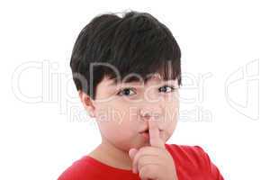 shh. secret - Young boy with his finger over his mouth