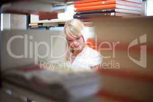 blond woman with a book