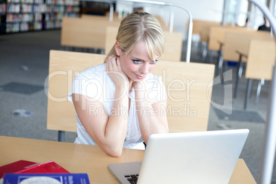 blond woman with laptop