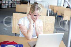 blond woman with laptop