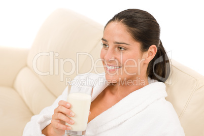 Attractive mid-aged woman drink milk for breakfast