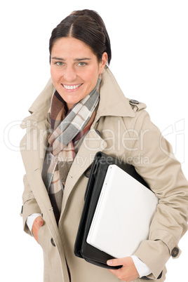Autumn fashion businesswoman holding briefcase