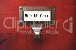 Lustrous Wooden Cabinet with Health Care File Label