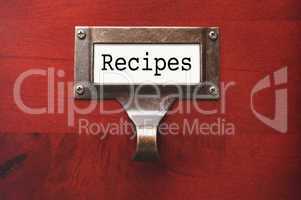 Lustrous Wooden Cabinet with Recipes File Label