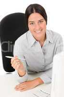 Successful business woman at office hold pen