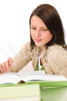 Student teenager girl write homework with book