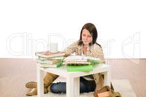 Student girl studying home sitting on floor