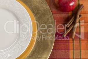 Abstract Table Setting of Apple and Cinnamon with Plate