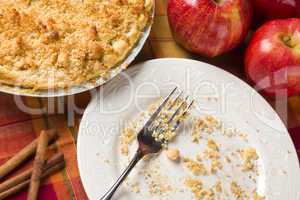 Overhead Abstract of Apple Pie, Empty Plate and Crumbs