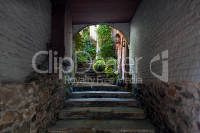 Old alley leading to garden