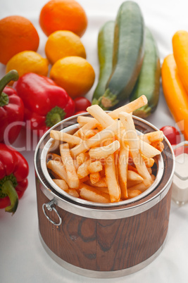 fresh french fries on a bucket