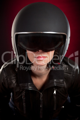 Biker girl in a helmet