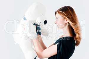 Pretty woman with white bear