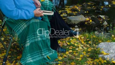 elderly woman at autumn park