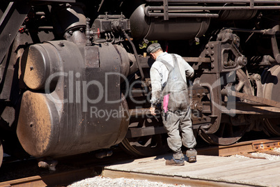 Mechanic checks locomotive