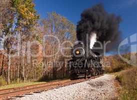 WM Steam train powers along railway